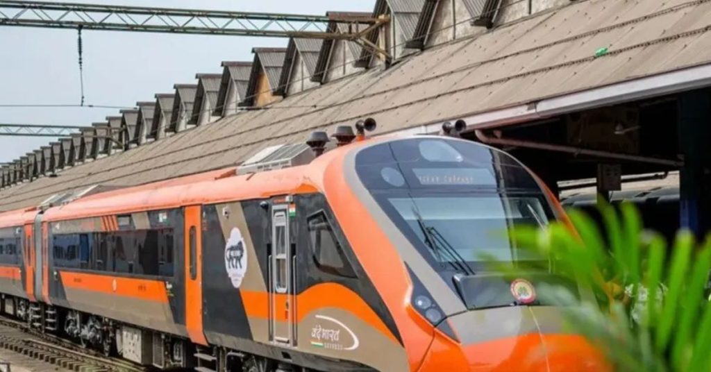 Saharanpur Lucknow Vande Bharat Express train at the station platform with passengers boarding and modern coach design.